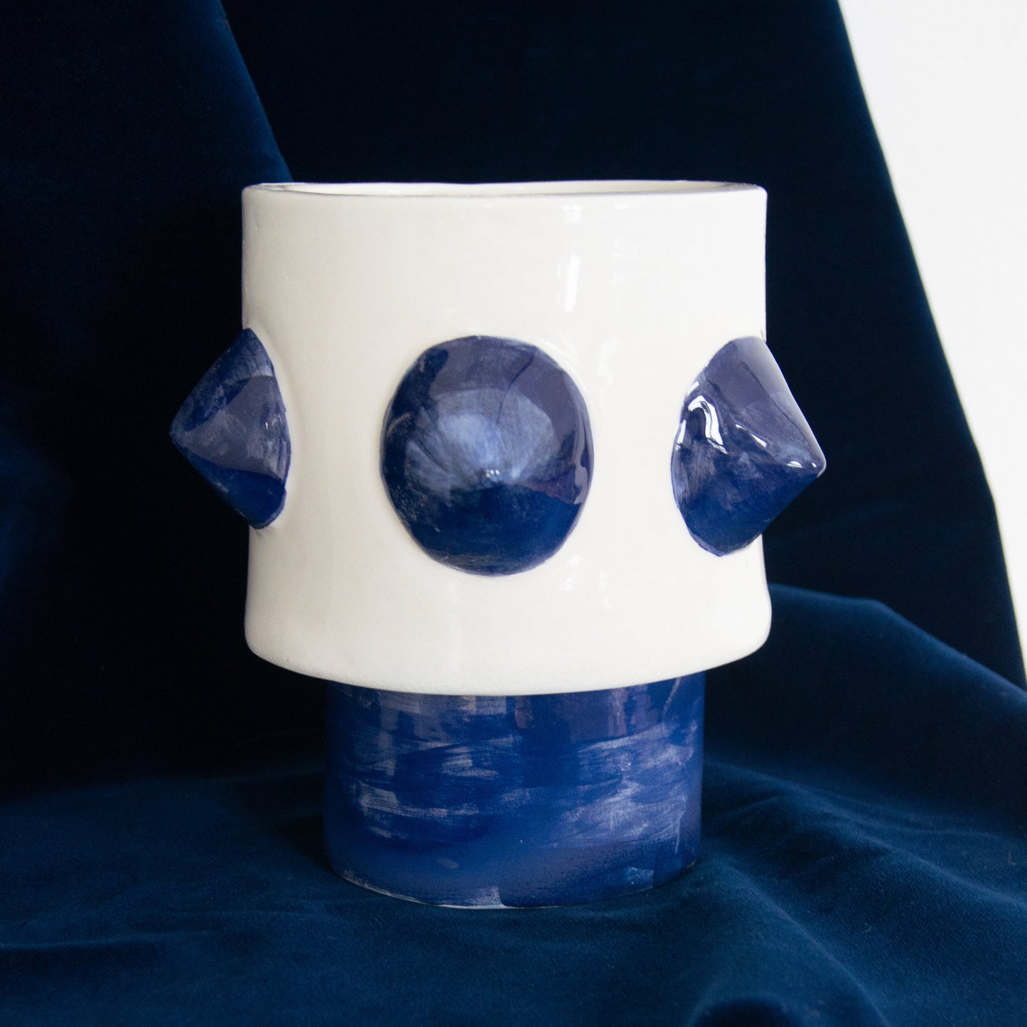 Handcrafted vase designed for plants, featuring a striking design.