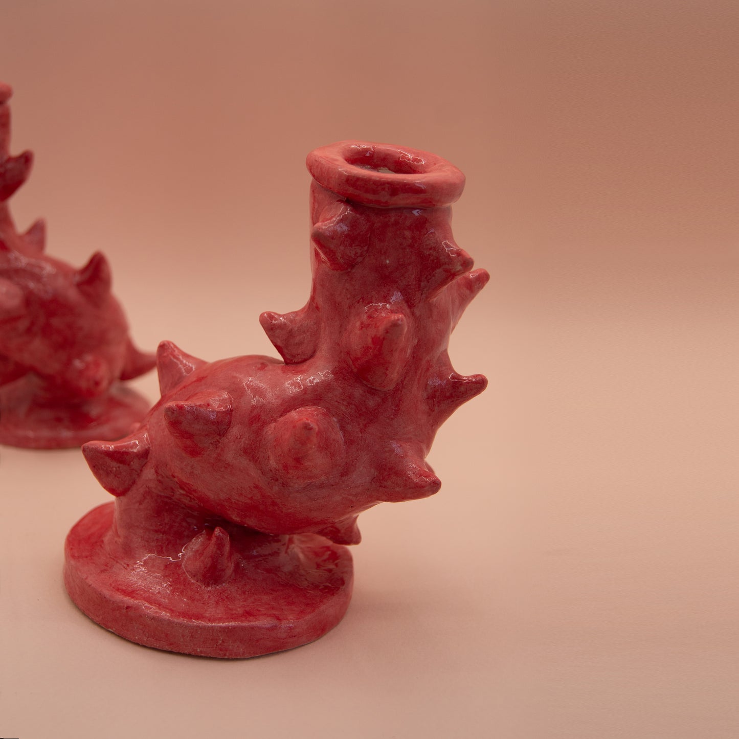Spiky red ceramic candlesticks