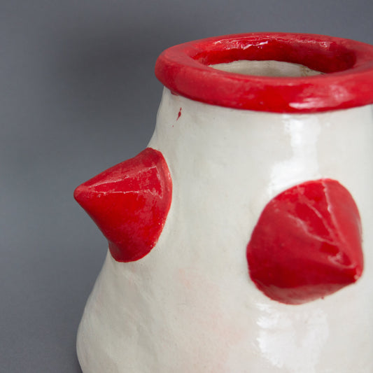 Red ceramic vase with bold shape